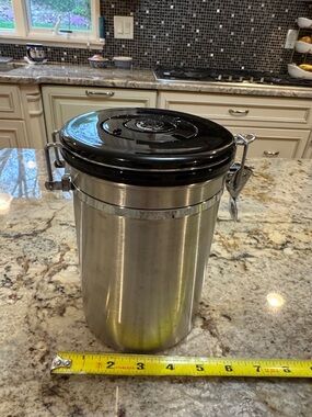 Friis Stainless Steel Airtight Canister with Black Lid for coffee beans.